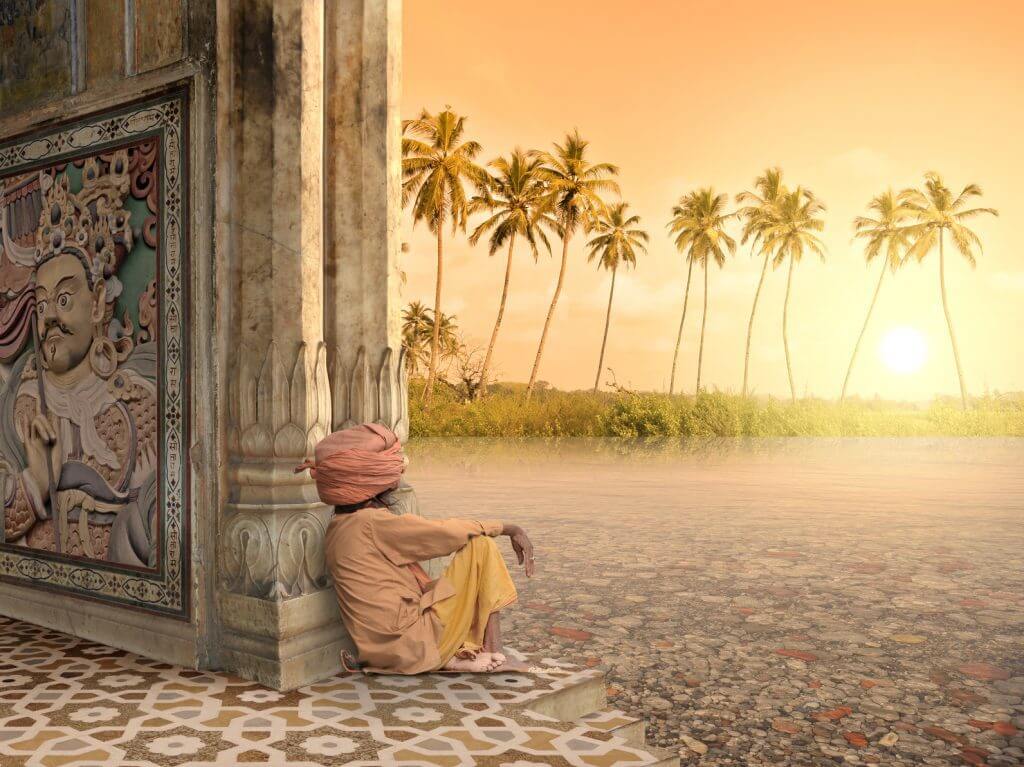 hombre la religión hinduista contempla la puesta de sol